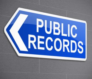 A sign talking about public records to help you when selling your home.