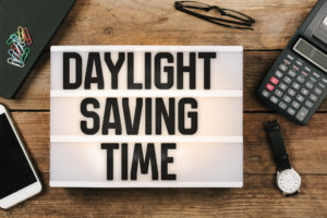 Image on a desk that says Daylight Saving Time
